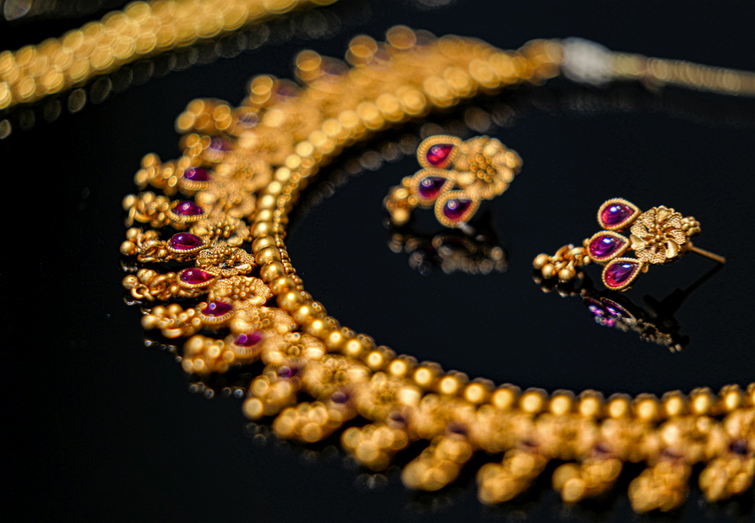 Faceted gemstones and precious stones on display